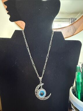 Silver Crescent Moon Necklace with Blue Eye Pendant by